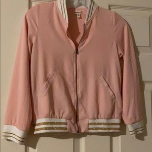 Light pink jacket with white accents